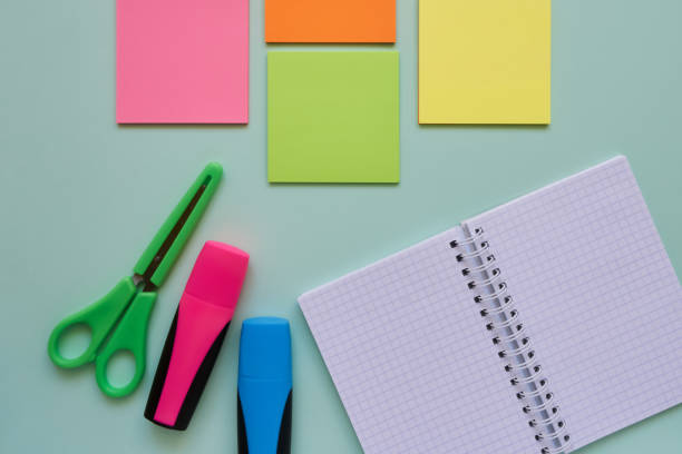 istock School subjects on a blue background. Back to school concept. Flat lay, copy space 1164938020