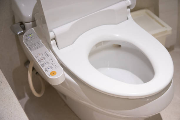 istock electronic control panel of toilet sanitary ware with automatic flush system, japan toilet bowl. 1164939571