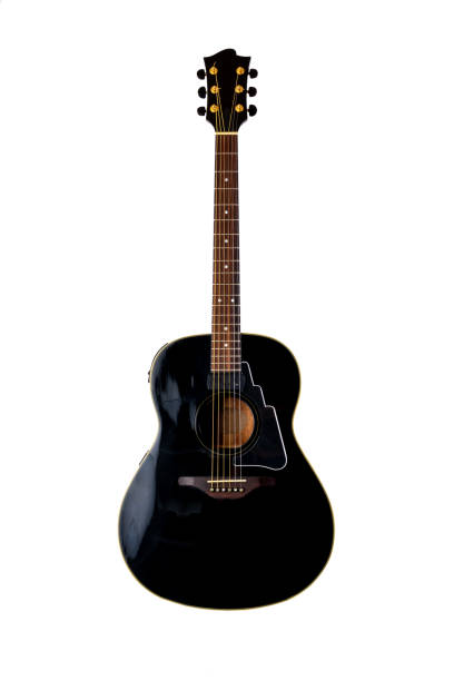 istock musical instrument wooden six-string guitar red isolated on blackbackground 1164946924
