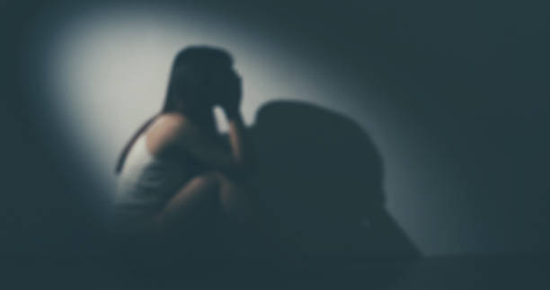 istock The Depression Woman Sit On The Floor 1164947837