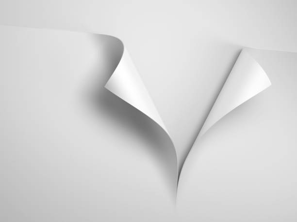 istock white sheet of paper with corner curl 1164948531