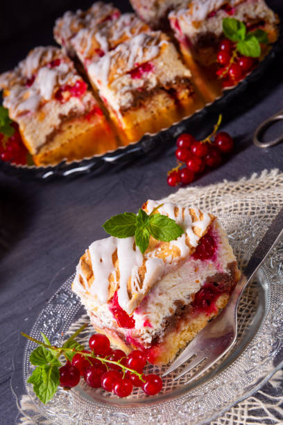istock Cheese cake with meringue and red currants 1164948551