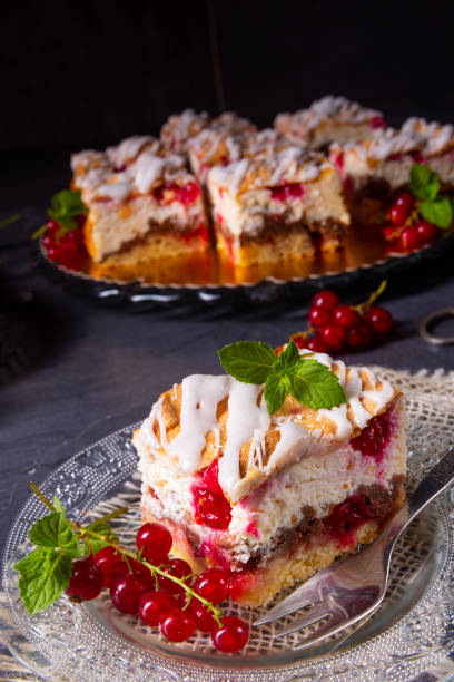istock Cheese cake with meringue and red currants 1164948604