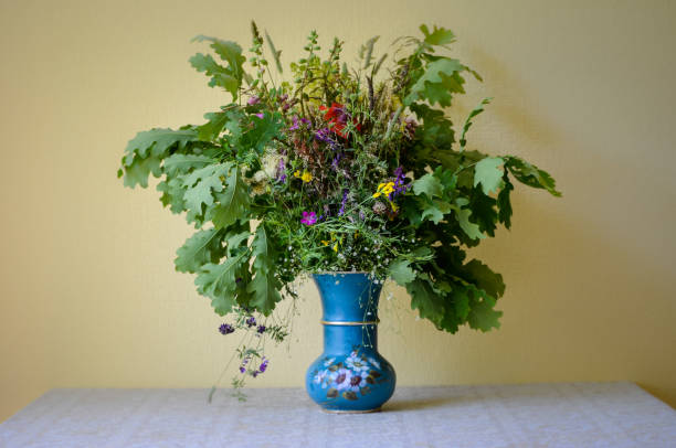 istock Bouquet of field flowers on a table 1164949909