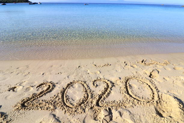 istock 2020 on a sandy background on the beach 1164950724