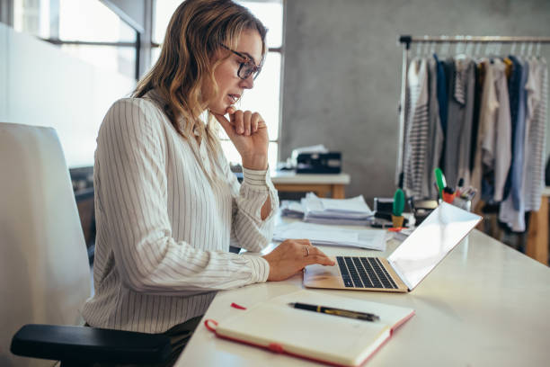 istock Dropshipping business owner looking for new orders 1164952461