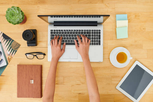 istock Woman working on laptop at office 1164953145