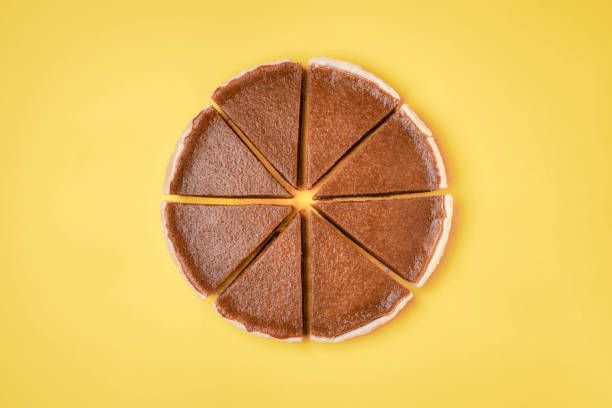 istock Sliced pumpkin pie. Traditional pie. Flat lay 1164953220