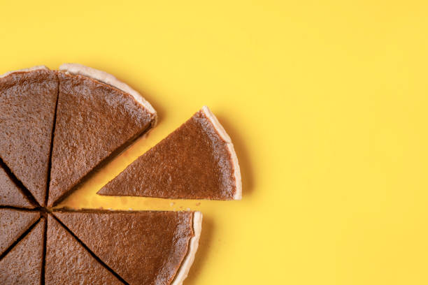istock Traditional pumpkin pie cut in slices 1164954718