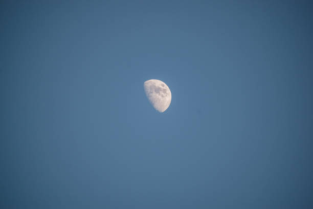 istock Partial moon glows bright over Los Angeles, CA in summer 1164955227