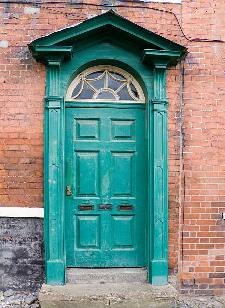 istock Grungy Old Green Door 116495875