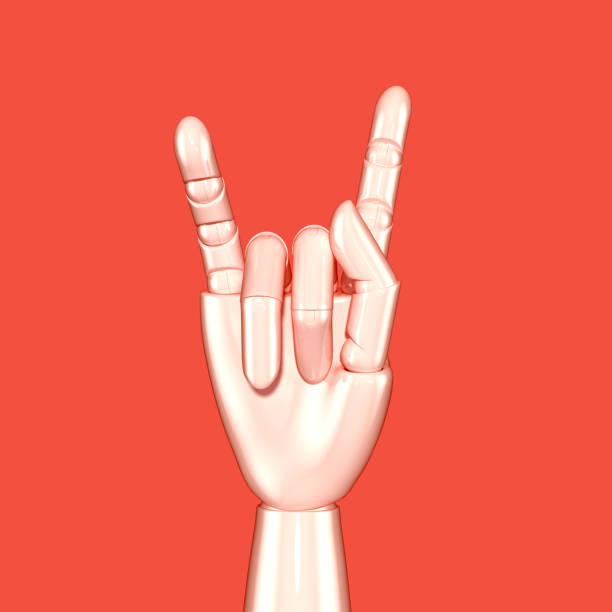 istock Isolated on pink artificial hand showing horns geisture 1164959685
