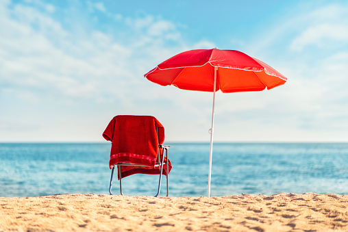 Umbrella and chair on the beach