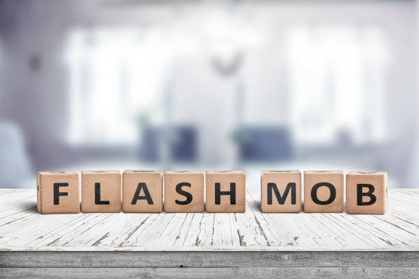 flash mob message sign on a table in a bright room - equal opportunity flash imagens e fotografias de stock