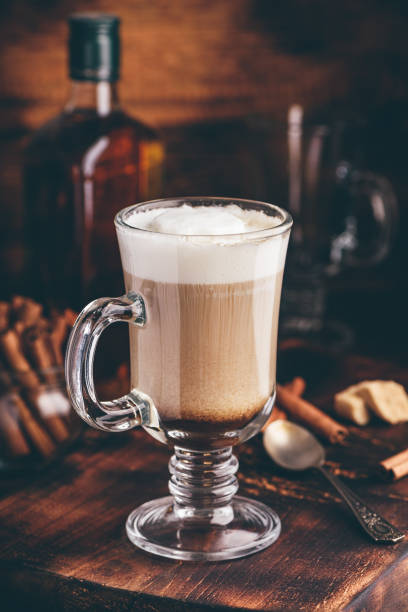 istock Coffee with Irish whiskey and whipped cream in glass 1164965376