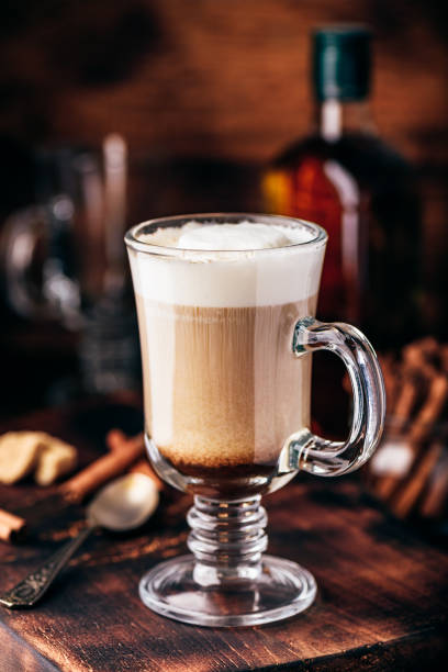istock Coffee with Irish whiskey and whipped cream in glass 1164965885