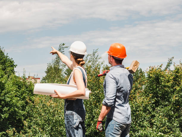istock Young engineer woman and her subordinate worker 1164966945