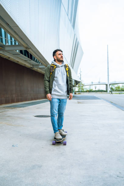 istock Longboarding in Barcelona streets 1164967301