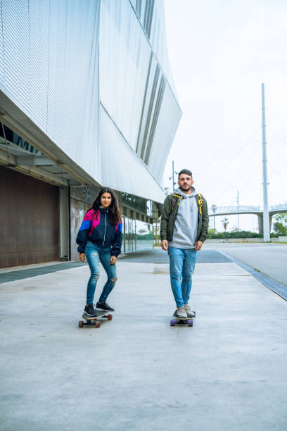 istock Longboarding together in Barcelona 1164967302