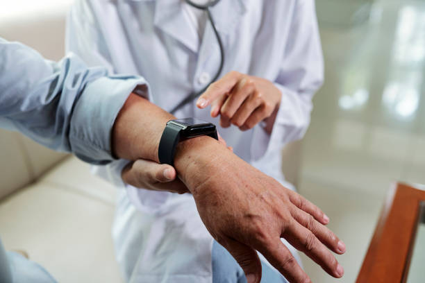 istock Doctor checking pulse of the patient 1164972828