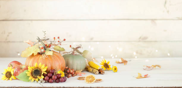 istock Autumn Pumpkin Background on wood 1164976730
