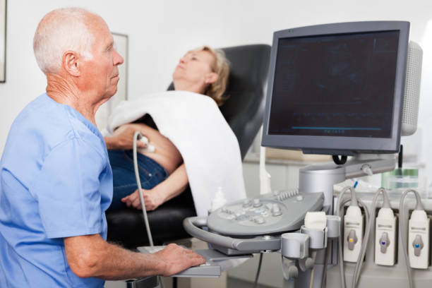 istock Skilled doctor diagnosing patient using ultrasound scanner 1164978191