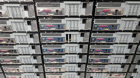 Stack of computers with connections showing