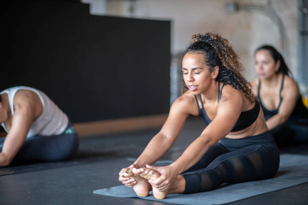 istock Stretching in the gym 1164979890