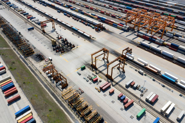 istock Cargo Containers and Freight Trains, Aerial View 1164981629