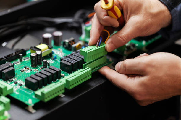 istock A man checks the motherboard, processor hardware, digital technology close-up 1164981991