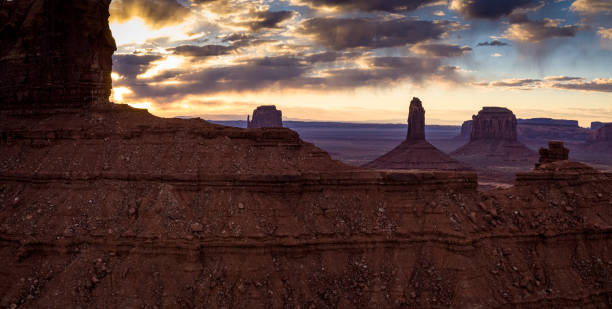 istock Dramatic Aerial Shot Peering Into Monument Valley 1164992578