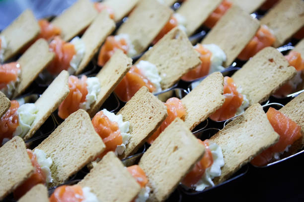 norwegian smoked salmon canapes with cream cheese - canape appetizer gourmet salmon imagens e fotografias de stock