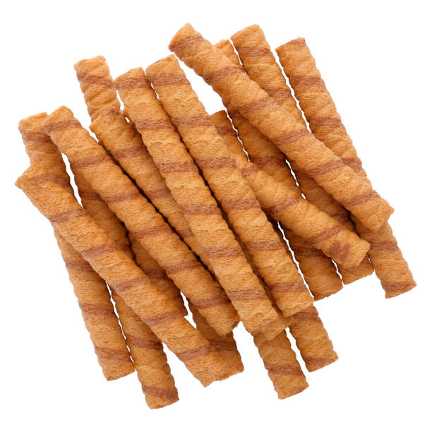 istock Wafer rolls with chocolate and cocoa filling isolated on white 1165000860