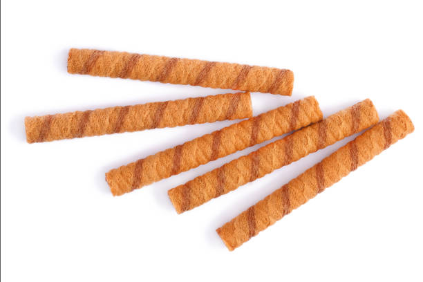 istock Wafer rolls with chocolate and cocoa filling isolated on white 1165000861