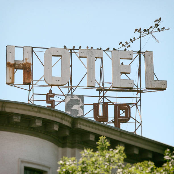 istock Hotel Sign and Pigeons 1165001654