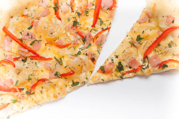 istock Pizza slice isolated on white background, with onions, bacon and cherry tomatoes, thin pastry crust, closeup. 1165002606