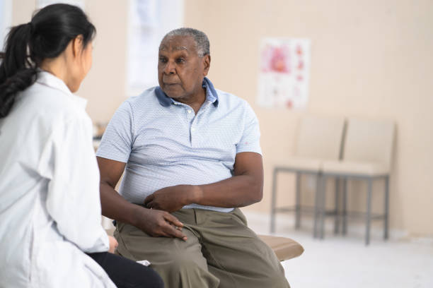 istock Senior man talking to doctor 1165005993