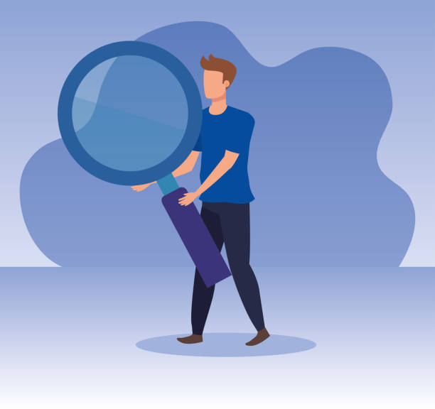 istock businessman with magnifying glass and business strategy 1165011308