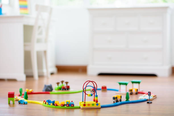 istock Kids room with wooden railway and train. 1165013261