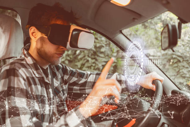 istock driver using vr glasses in his car,future driving concept 1165019679