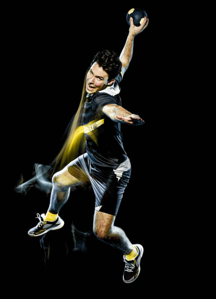 istock handball player young man isolated speed light painting 1165021462