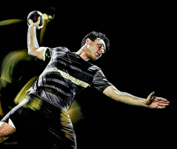istock handball player young man isolated speed light painting 1165021501