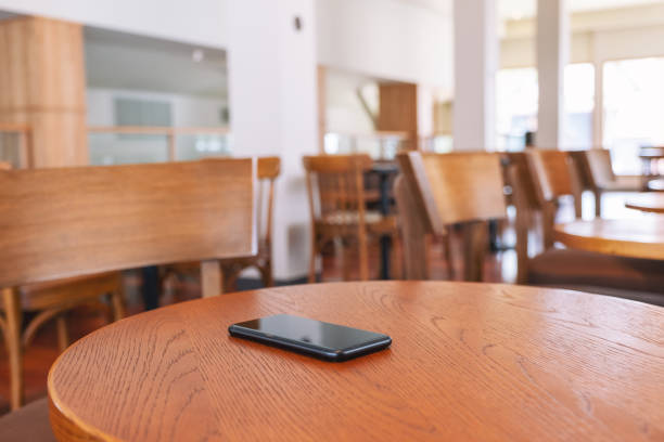 istock a black mobile phone on the table 1165024060
