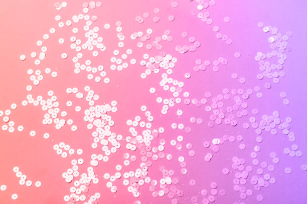 istock Holographic sparkles on neon colors background. Festive trendy backdrop 1165027553