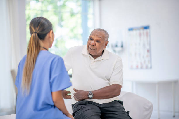 istock Senior adult at medical appointment 1165028811