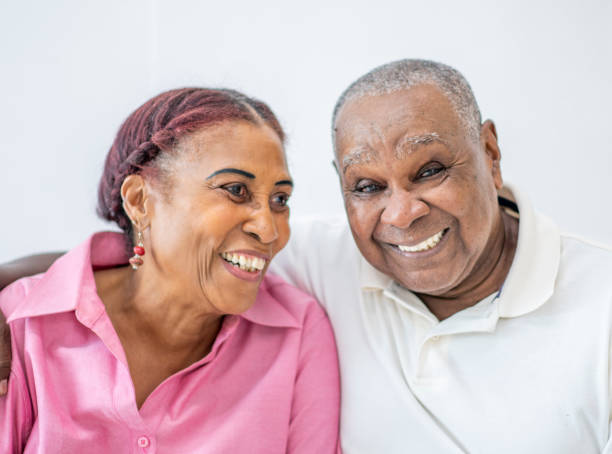 istock Senior couple laughing together 1165028840