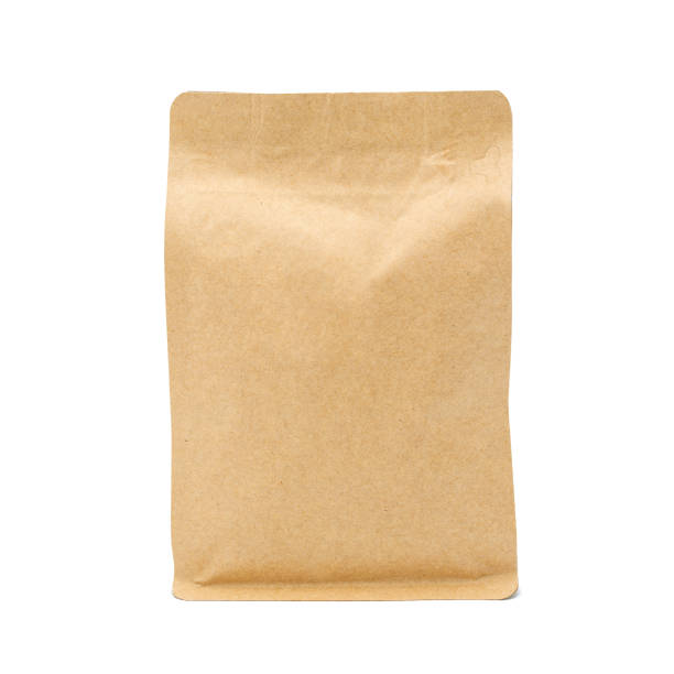 istock Brown paper bag isolated on white background 1165028863