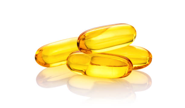 istock Fish Oil supplement Capsules isolated on white background 1165030383