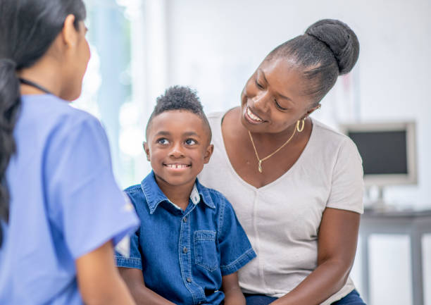istock Cute little boy at the doctor's office 1165032199