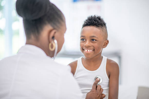 istock Cute little boy at the doctor's office 1165032243